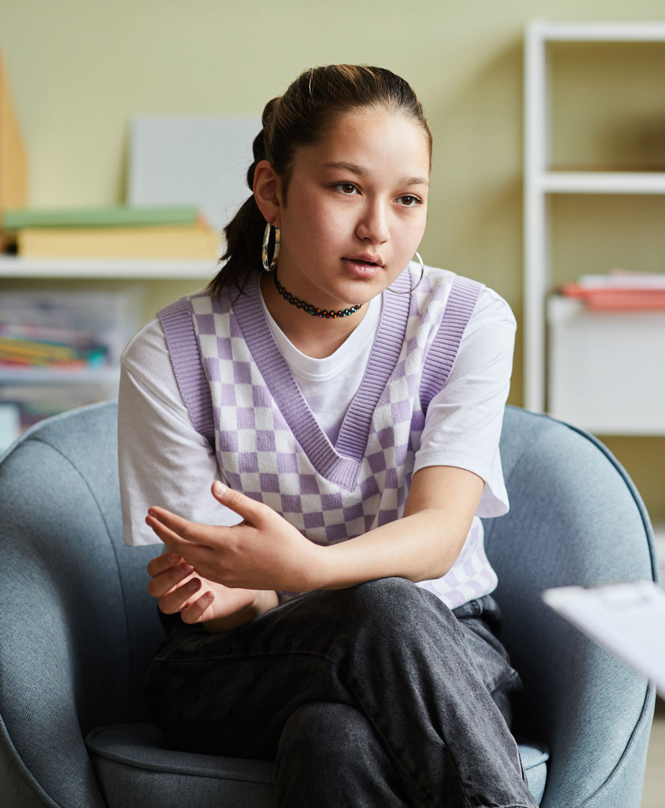 Girl sitting on Chair